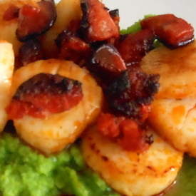 Grilled scallops and chorizo over minted pea puree