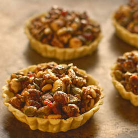 pumpkin seed, cranberry and nut tartlets