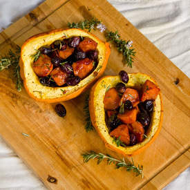 Roasted Acorn Squash with Black Grapes, Persimmons